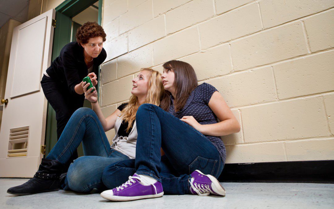 Students with their phones